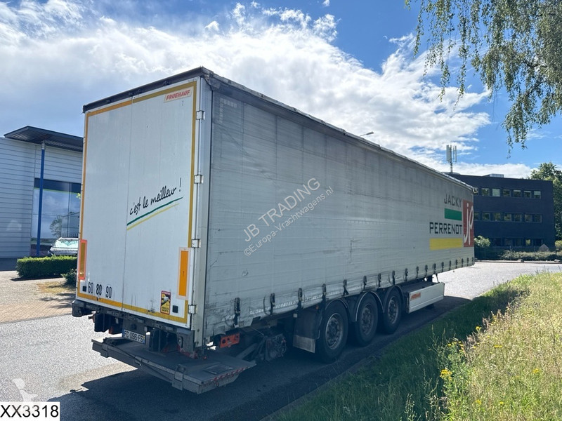 نصف مقطورة Fruehauf Tautliner Dhollandia
