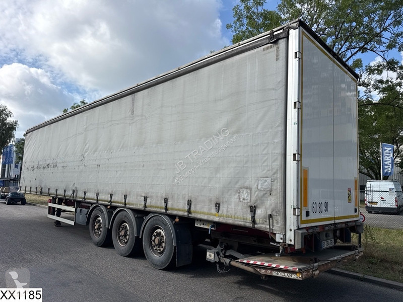 نصف مقطورة Fruehauf Tautliner Dhollandia