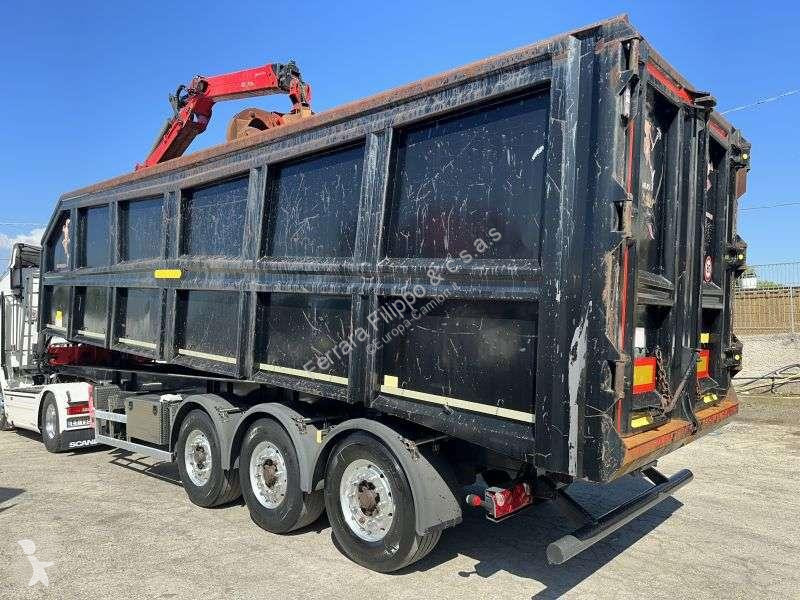 Semitrailer ribaltabile con gru caricatrice