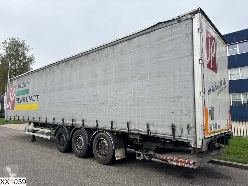 نصف مقطورة Fruehauf Tautliner Dhollandia