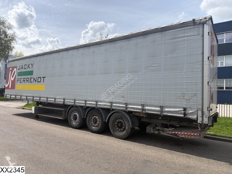 نصف مقطورة Fruehauf Tautliner Dhollandia