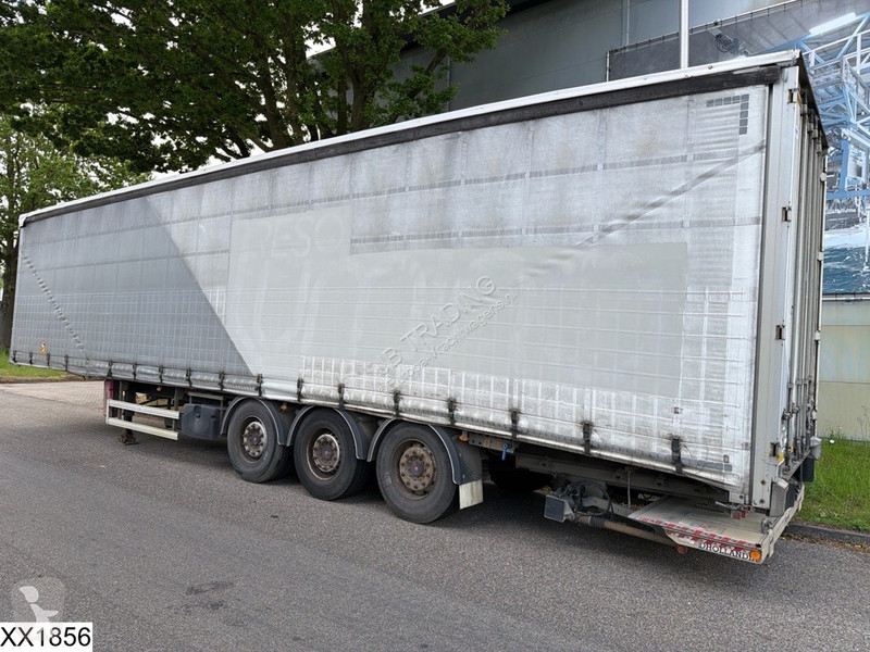 نصف مقطورة Fruehauf Tautliner Dhollandia