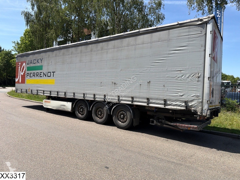 نصف مقطورة Fruehauf Tautliner Dhollandia