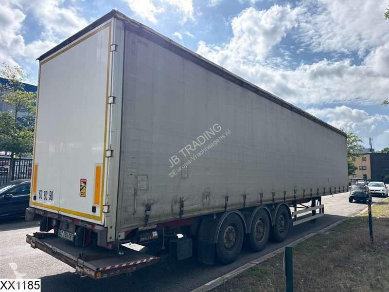 نصف مقطورة Fruehauf Tautliner Dhollandia