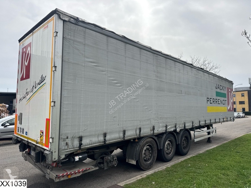 نصف مقطورة Fruehauf Tautliner Dhollandia