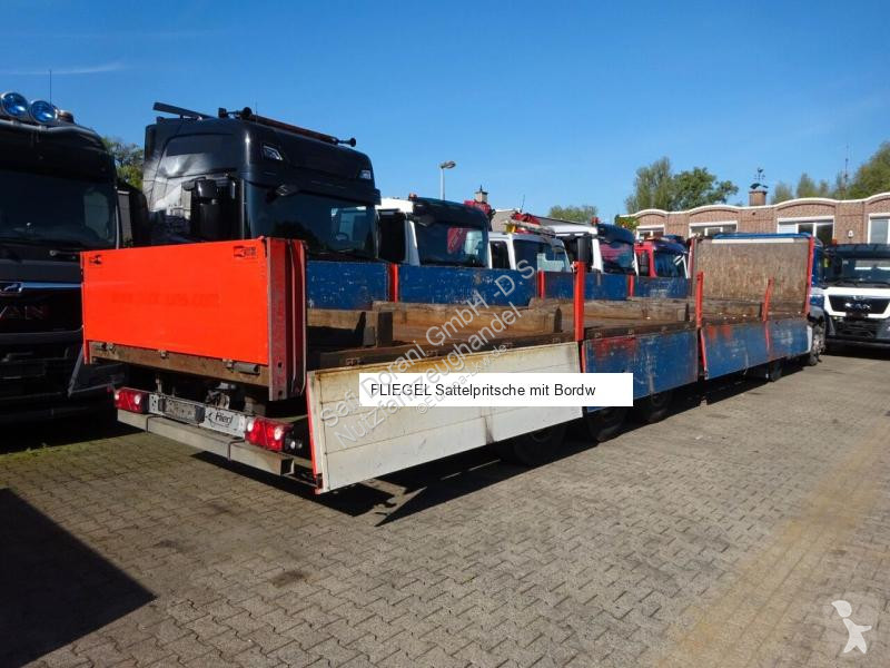 نصف مقطورة Fliegl Sattelpritsche mit Bordwänden...