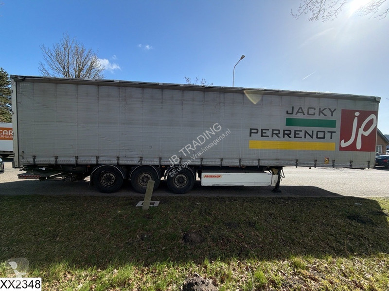 نصف مقطورة Fruehauf Tautliner Dhollandia