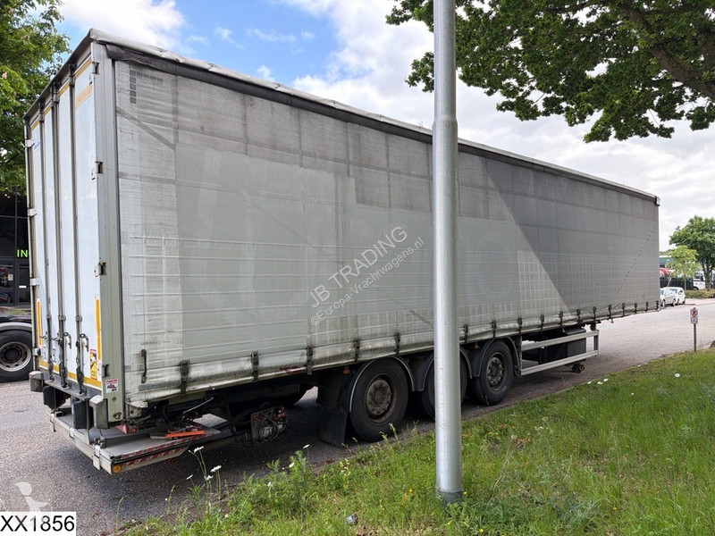نصف مقطورة Fruehauf Tautliner Dhollandia