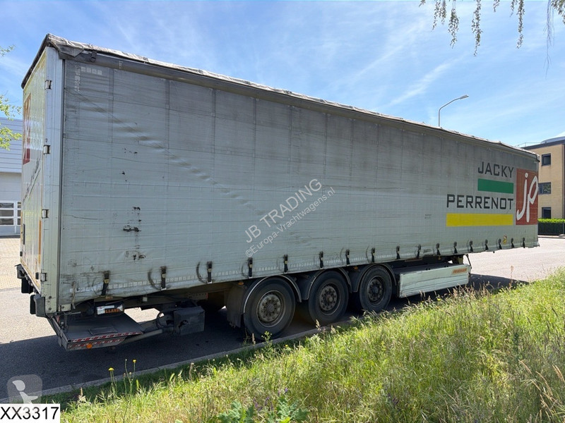 نصف مقطورة Fruehauf Tautliner Dhollandia