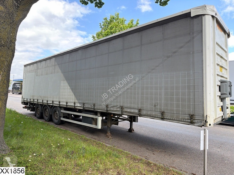 نصف مقطورة Fruehauf Tautliner Dhollandia