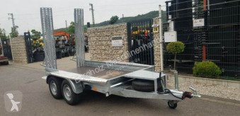Прицеп Baumaschinentransporter mit Rampen 2700 kg трал б/у