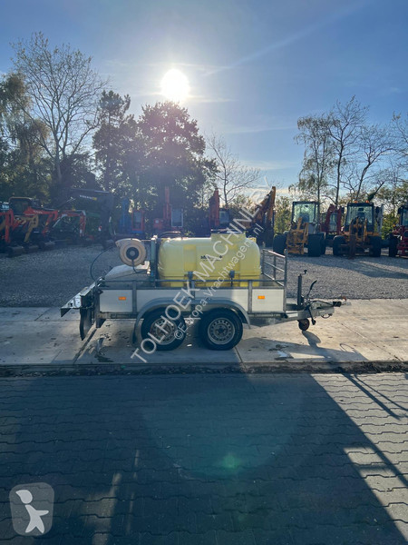 Hapert Tademasser met gladheidbestrijding trailer