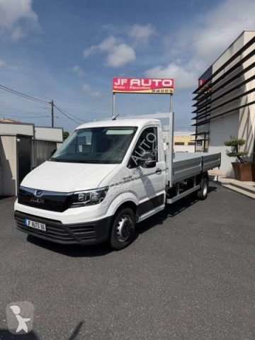 Utilitaire plateau ridelles MAN