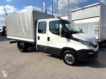 Utilitaire plateau ridelles Iveco