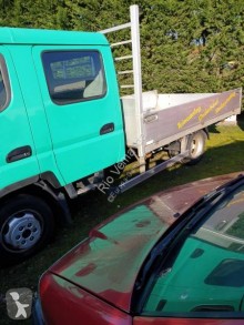 Utilitaire plateau ridelles occasion Mitsubishi Fuso Canter 3C13