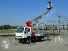 Furgoneta Nissan Cabstar plataforma elevadora sobre camión usada