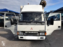 Mitsubishi Canter FE331 nyttobil med hytt chassi begagnad