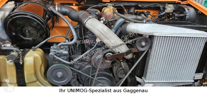 Veicolo per la pulizia delle strade Unimog U1400
