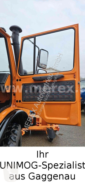Veicolo per la pulizia delle strade Unimog U1400