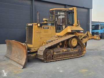 Buldozer na pásech Caterpillar