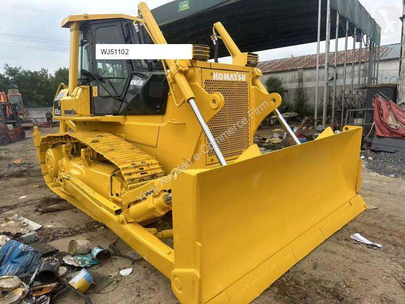 Spycharka Komatsu X
