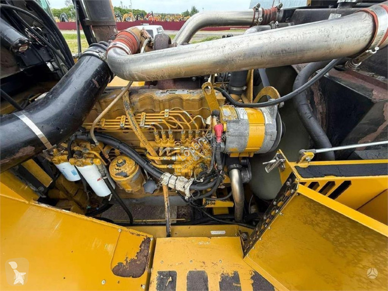 Карьерный самосвал Caterpillar TerraGator 2104...