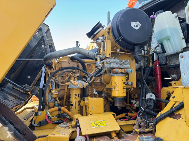Sklápač Caterpillar - Dutch Machine / Body Heating