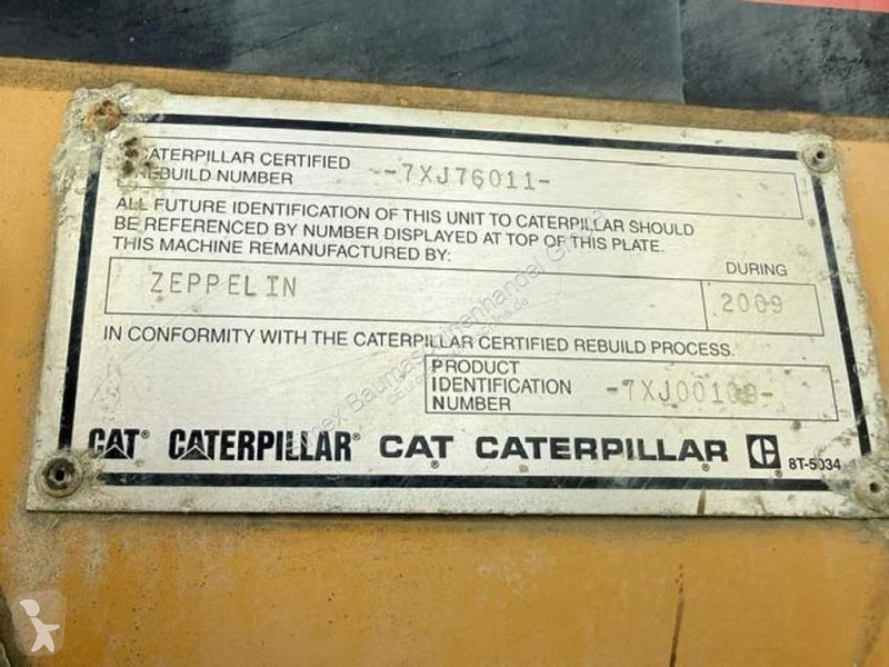 Sklápač Caterpillar