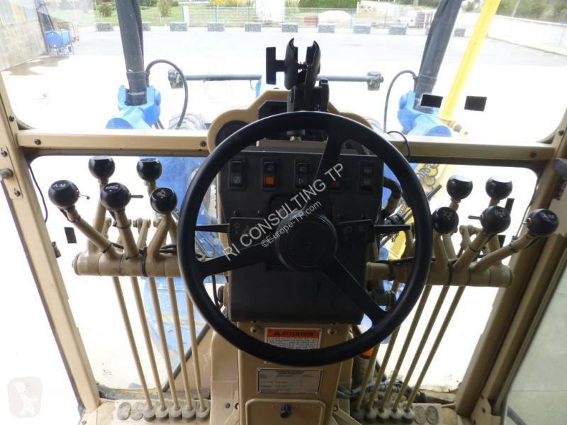 Niveleuse Caterpillar Lame AV+riper