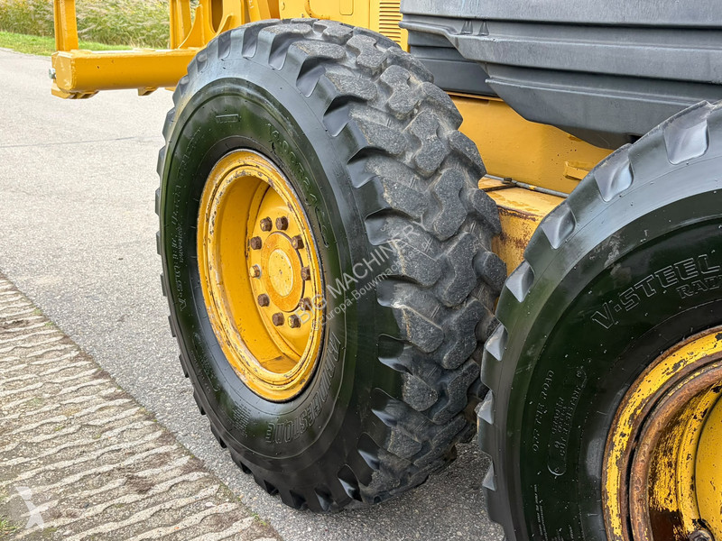 Грейдер Caterpillar