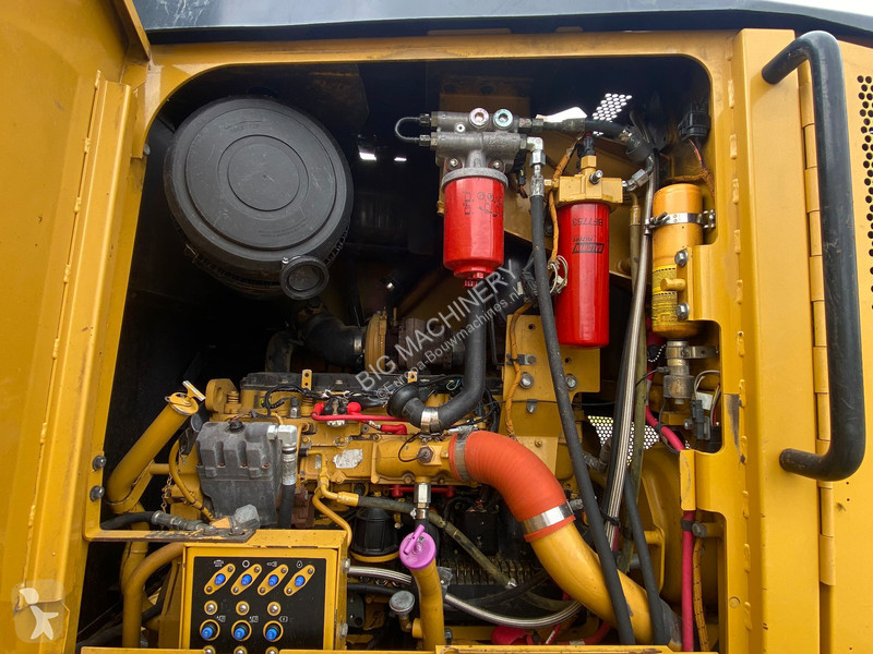 Grejder Caterpillar 140M