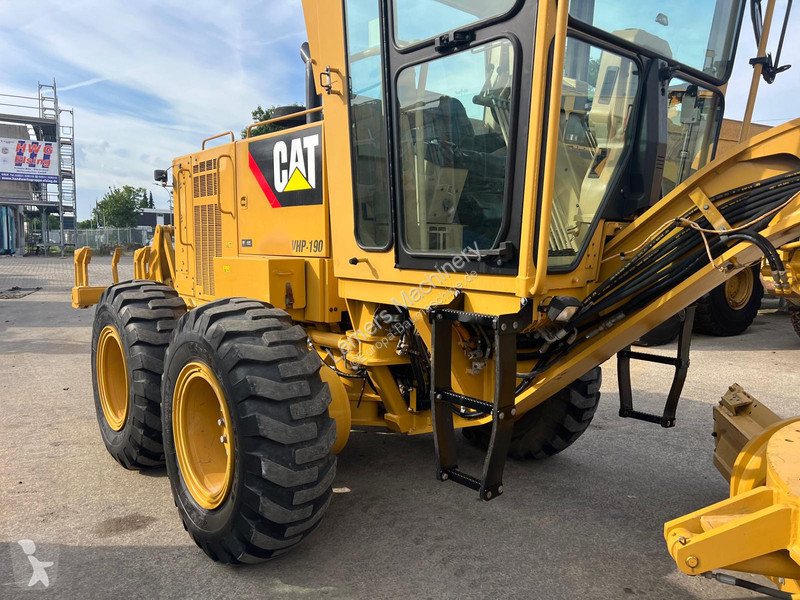 Grejder Caterpillar 140K .