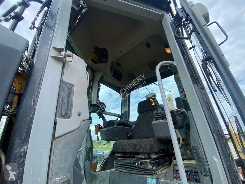 Grejder Caterpillar 140M