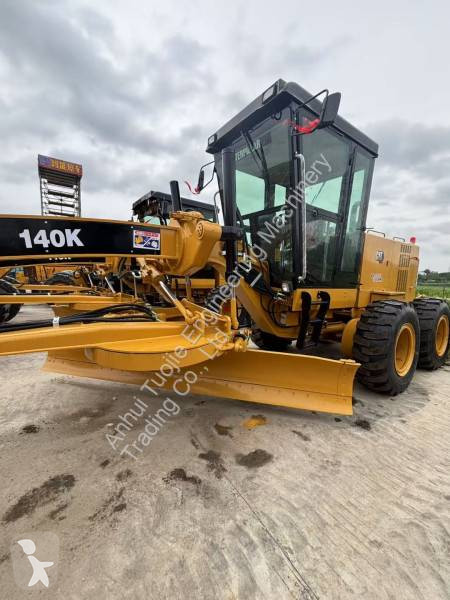 Grejder Caterpillar 140K