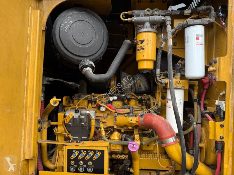 Grejder Caterpillar 140 M