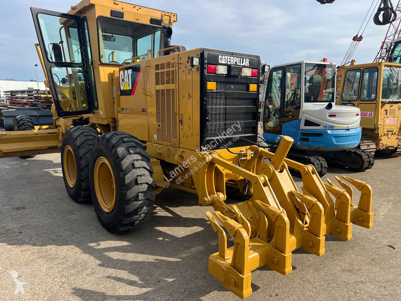 Grejder Caterpillar 140K .