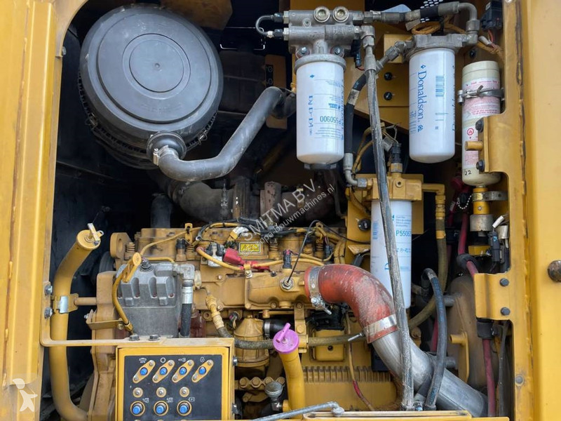 Grejder Caterpillar 140M