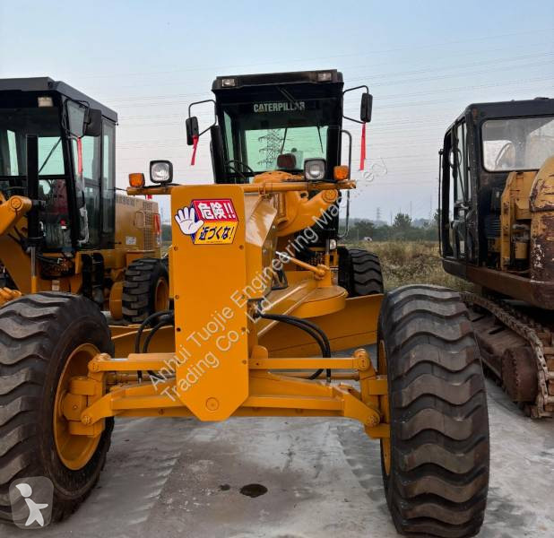 Grejder Caterpillar 140K