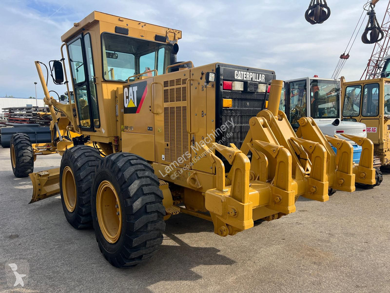 Grejder Caterpillar 140K .