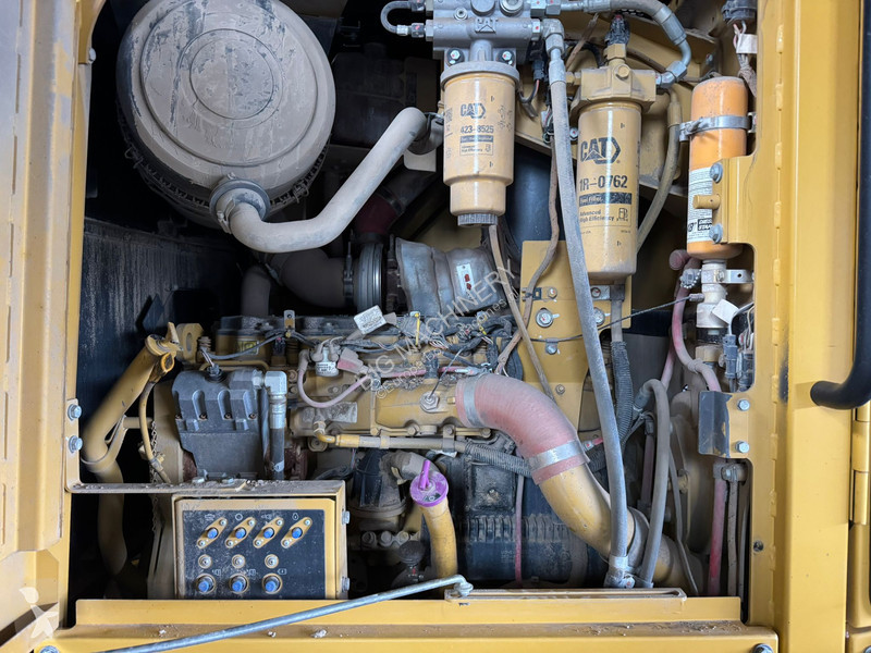 Grejder Caterpillar 140M