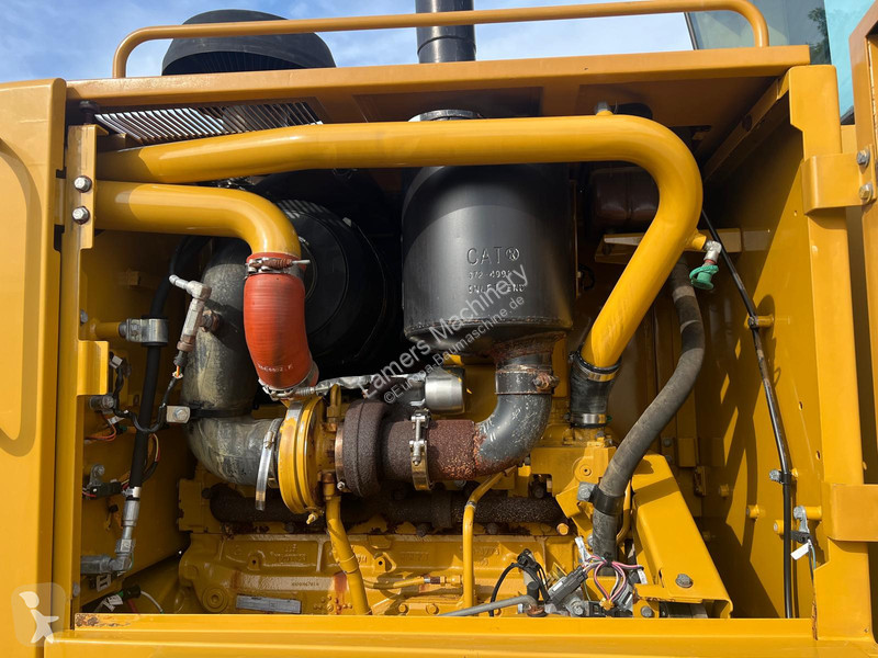 Grejder Caterpillar 140K .