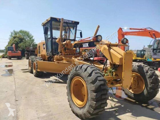 Grejder Caterpillar 140K