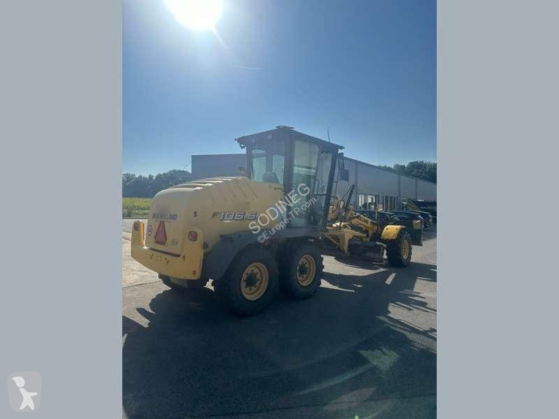 Planeringshøvl New Holland F106.6A 6X6 MACHINE...