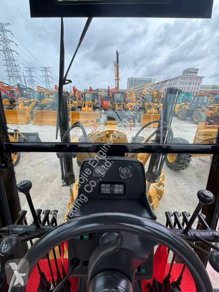 Grejder Caterpillar 140K
