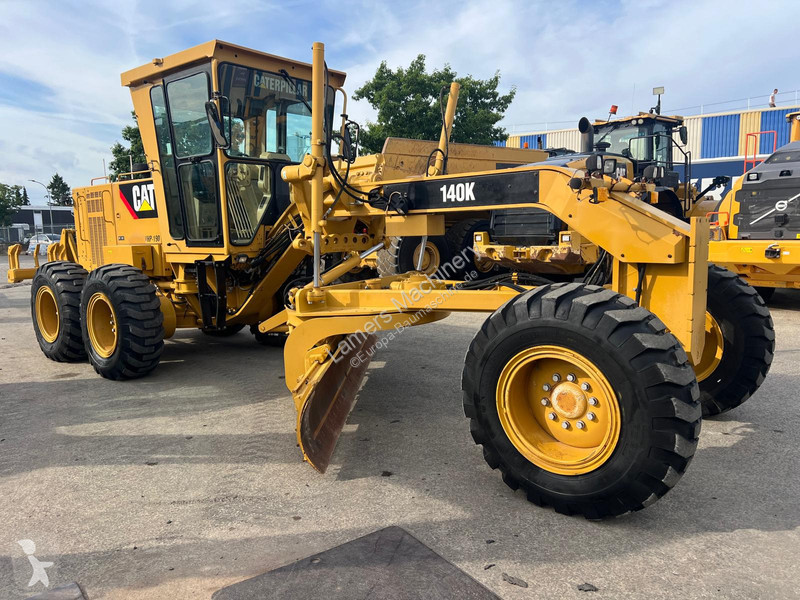 Grejder Caterpillar 140K .