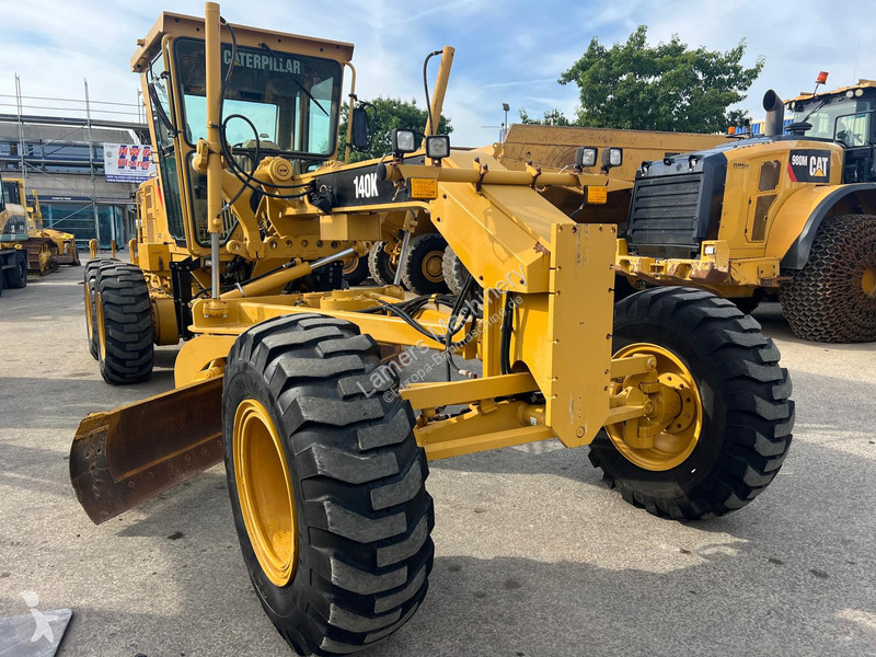 Grejder Caterpillar 140K .