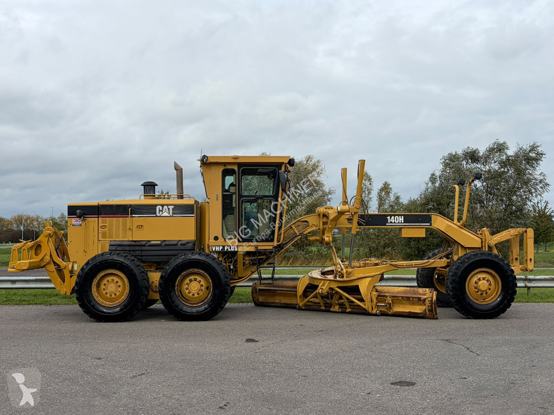 Грейдер Caterpillar