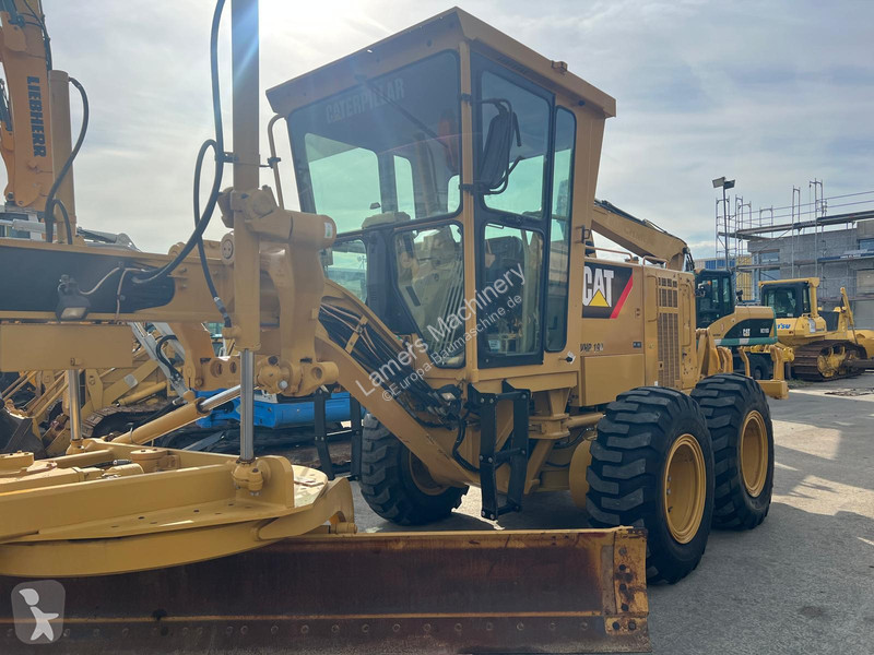 Grejder Caterpillar 140K .