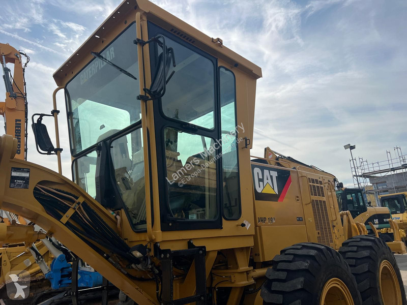 Grejder Caterpillar 140K .
