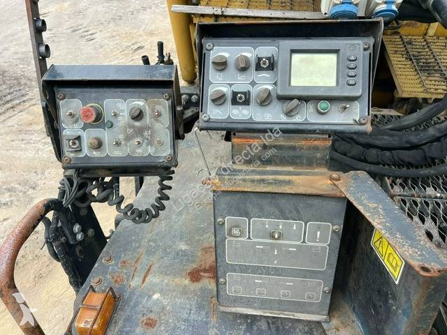 Cestné staviteľstvo Caterpillar ap555E